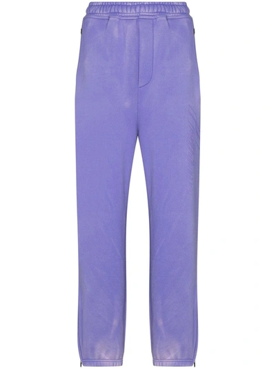 We11 Done Bleached Reflective Logo Track Trousers In Purple