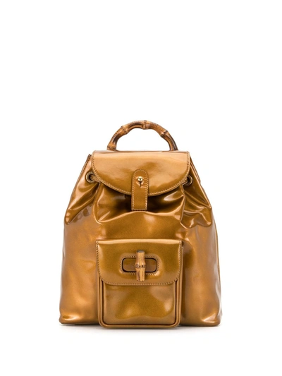 Pre-owned Gucci 1990s Bamboo Drawstring Flap Backpack In Gold