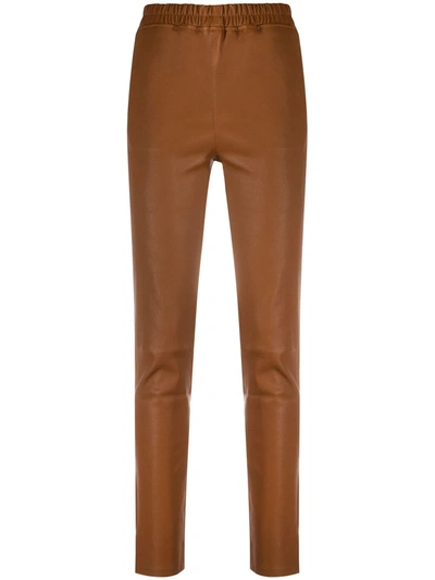 Arma Elasticated Leather Trousers In Brown