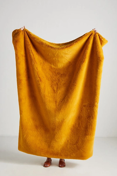 Anthropologie Sophie Faux Fur Throw Blanket In Yellow