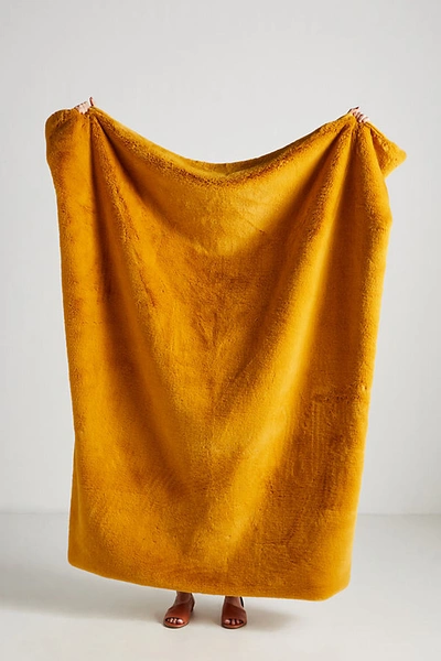 Anthropologie Sophie Faux Fur Throw Blanket In Yellow ModeSens
