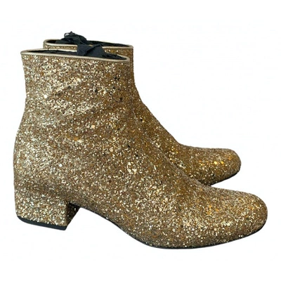 Pre-owned Saint Laurent Glitter Ankle Boots In Gold