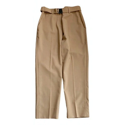 Pre-owned Brunello Cucinelli Wool Trousers In Camel