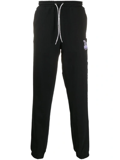 Puma Logo Print Track Pants In Black