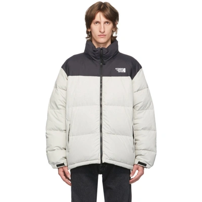 Vetements Two-tone Logo-print Quilted Down Jacket In Grey