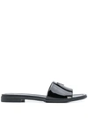 Prada Appliquéd Leather Slides In Black