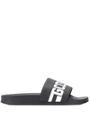 Gcds Logo Embossed Rubber Slide Sandals In Black