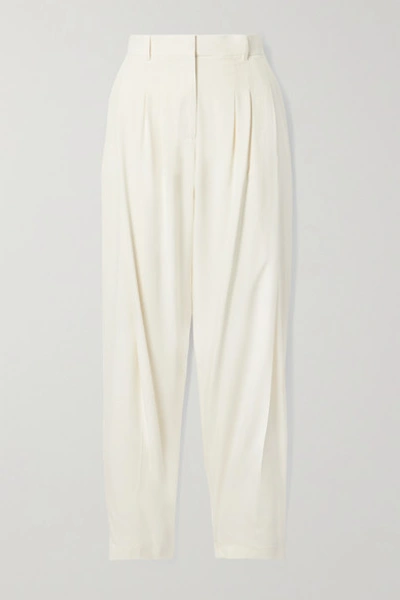 Ferragamo Pleated Washed-silk Tapered Pants In White