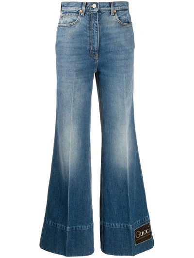 Gucci Logo Tag Flared Jeans In Blue