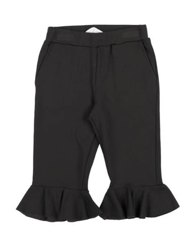 Touriste Casual Pants In Black