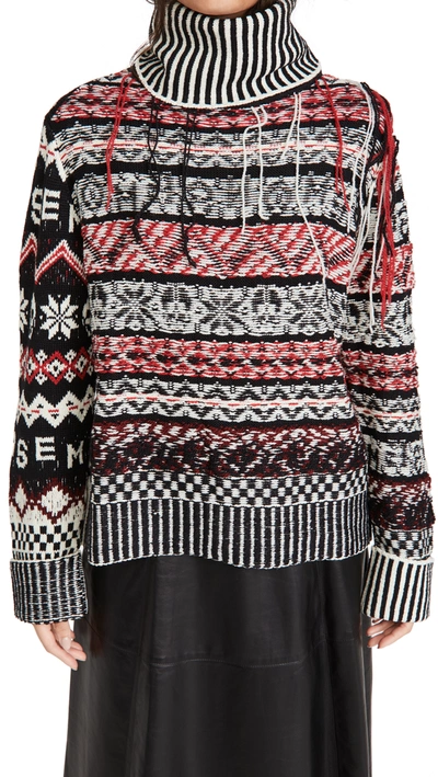 Monse Fringed Fair Isle Wool Turtleneck Sweater In Black