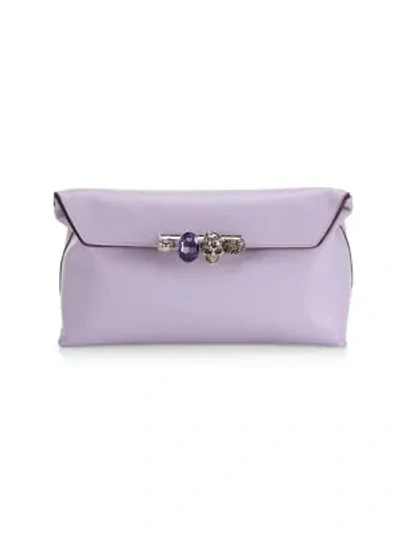 Alexander Mcqueen Skull Four-ring Soft Leather Clutch Bag In Lavender