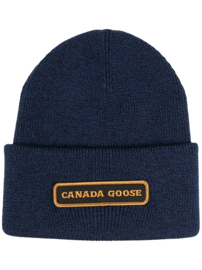 Canada Goose Logo-embroidered Merino Wool Beanie Hat In Navy Heather