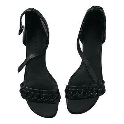 Pre-owned Sandro Patent Leather Sandals In Black