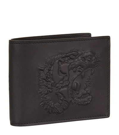 Gucci Embossed Lion |