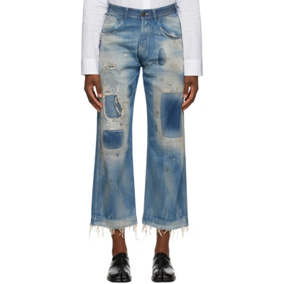 Maison Margiela Bagggy And Straight Jeans With Destroyed Details And Patches In Medium Wash