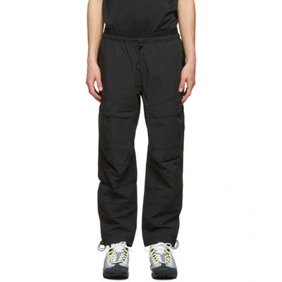 Nike Tech Pack Tapered Shell Sweatpants In Black
