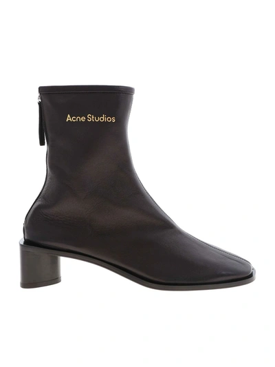 Acne Studios Golden Logo Ankle Boot In Black