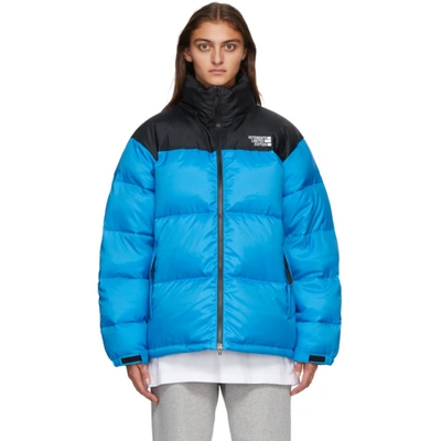 Vetements Logo Quilted Nylon Puffer Jacket In Blue