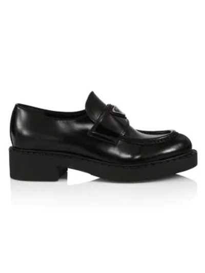 Prada Logo Leather Loafers In Black