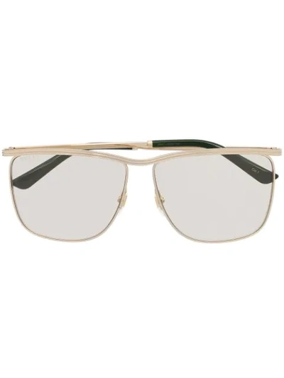 Gucci Lightly Tinted Oversized Sunglasses In Gold