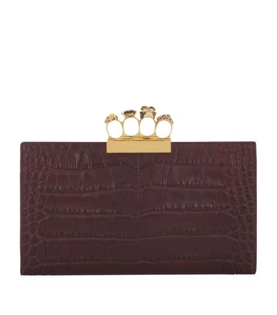 Alexander Mcqueen Skull Four Ring Flat Pouch In Oxblood