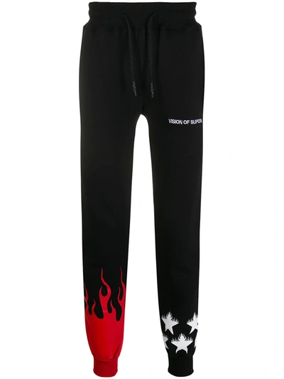Vision Of Super Flames And Stars Print Track Trousers In Black