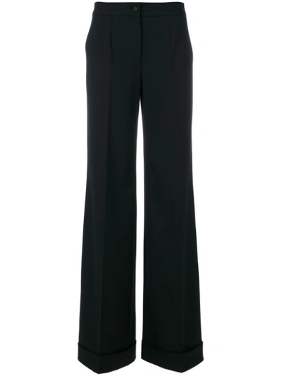 Dolce & Gabbana Stretch Wool-blend Flared Pants In Black