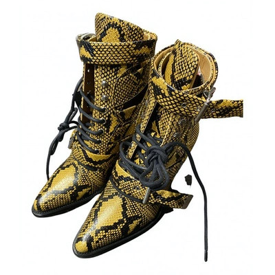 Pre-owned Chloé Rylee Leather Buckled Boots In Yellow