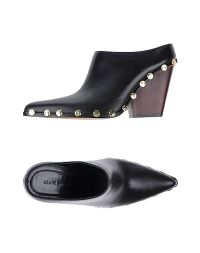 Celine Mules And Clogs In Black