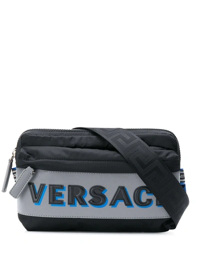 Versace Embossed Logo Belt Bag In Black