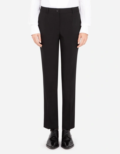 Dolce & Gabbana Low-rise Woolen Tuxedo Pants In Black