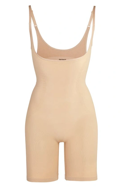 Skims Open Bust Bodysuit In Clay