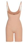 Skims Sculpting Open Bust Bodysuit In Ochre