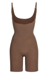Skims Open Bust Bodysuit In Oxide
