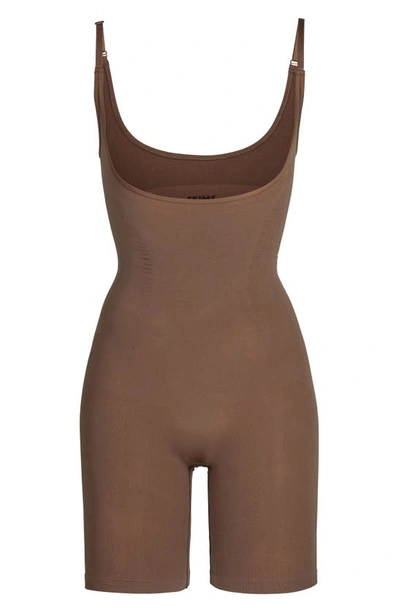 Skims Open Bust Bodysuit In Oxide