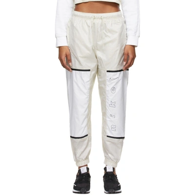 Nike Color Block Woven Sweatpants In Cream-white In Light Bone/white/black
