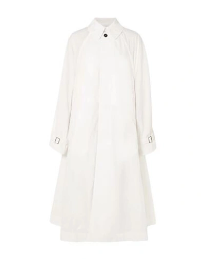 Deveaux Overcoats In White