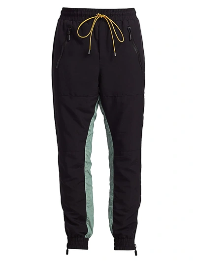 Rhude Colorblock Flight Pants In Black Blue