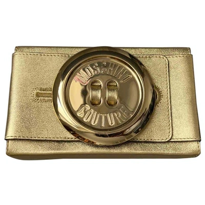 Pre-owned Moschino Leather Clutch Bag In Gold