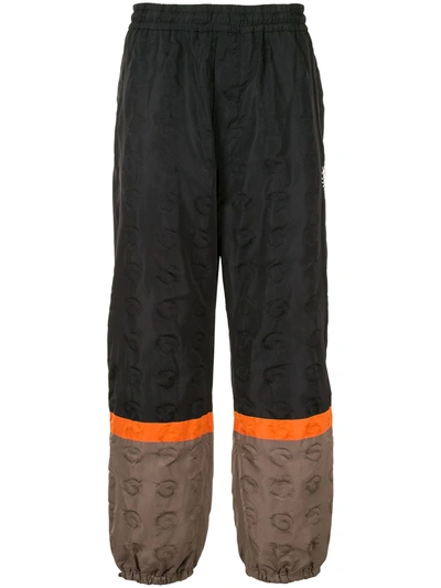 Undercover Panelled Logo Print Track Trousers In Black