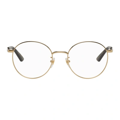 Gucci Gold Round Glasses In 002 Gold