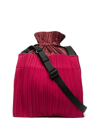 Issey Miyake Pleated Drawstring Cross-body Bag In Red