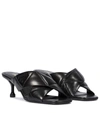 Prada Quilted Leather Mules In Black