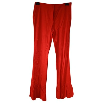 Pre-owned Sandro Trousers In Orange