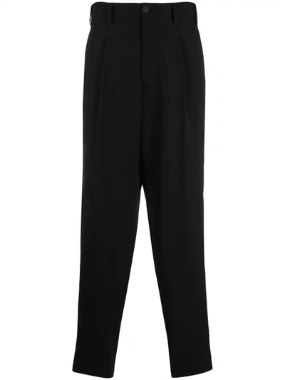 Yohji Yamamoto Elasticated-waist Tapered-leg Trousers In Black