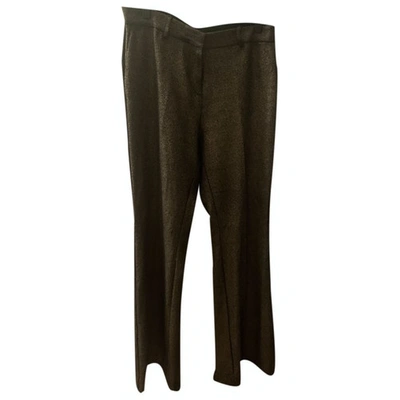 Pre-owned Ottod'ame Trousers In Gold