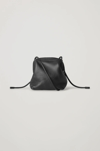 Cos Knotted Strap Leather Bag In Black