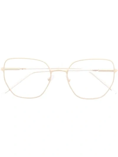 Prada Oval Wire-frame Optical Glasses In Gold