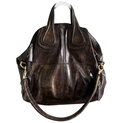 Pre-owned Givenchy Nightingale Patent Leather Handbag In Brown